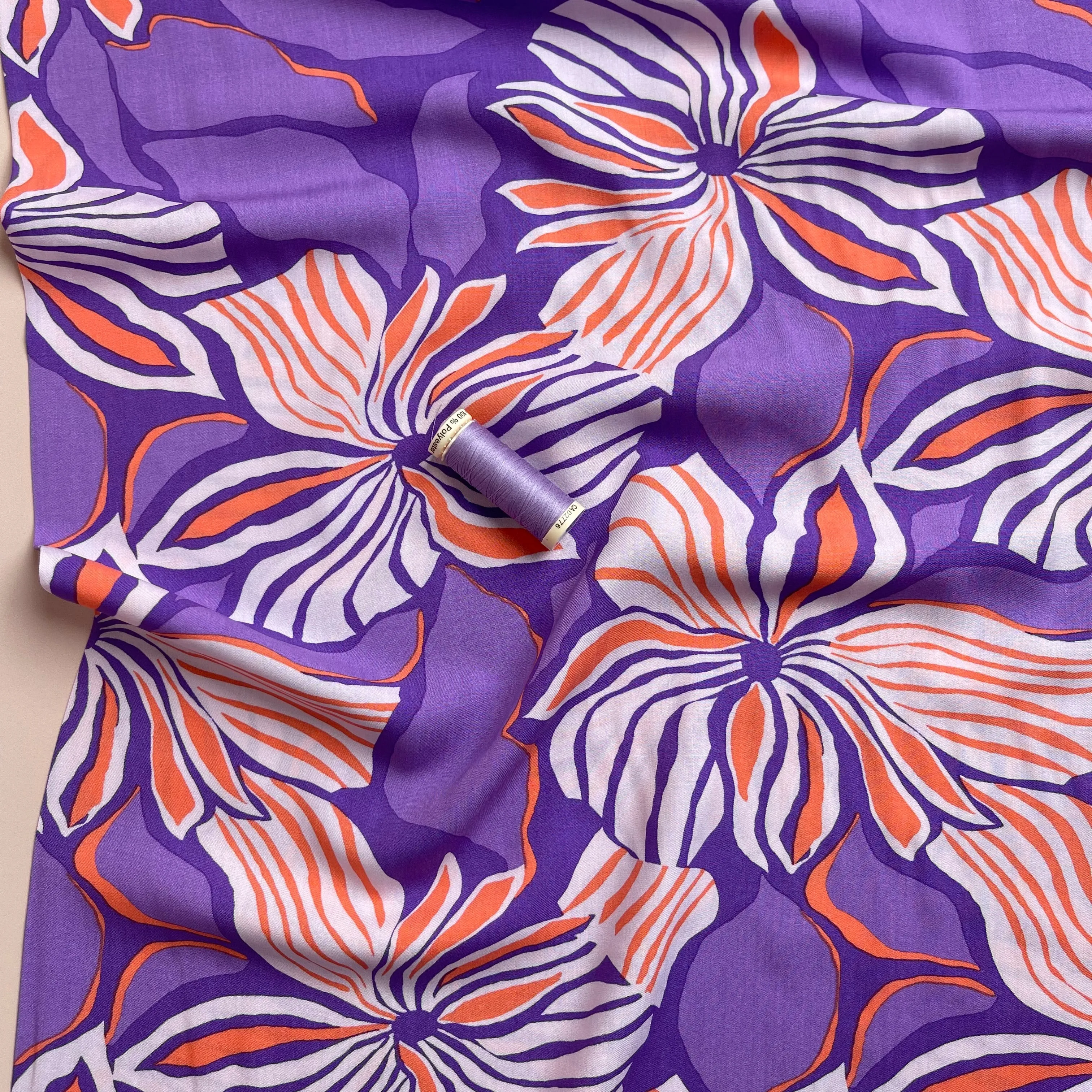 Bold Painted Flowers on Purple LENZING™ ECOVERO™ Viscose Fabric